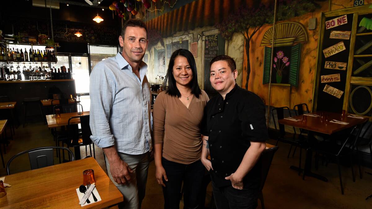 SUPPORT: Nikki Tran with Saigon Allee owners Ricky Collins and Lucy Nguyen ahead of a pop-up night. Picture: Adam Trafford
