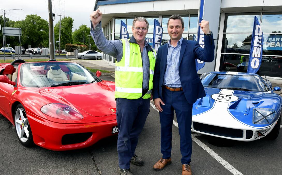 REVVED UP: MaxiTrans' Chris Liston and Eclipse Ford sales operations manager Martin Casser. Picture: Lachlan Bence