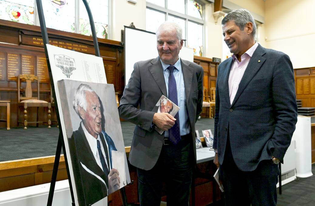 Mark Sheehan and former Victorian premier Steve Bracks reflect on the life of Ballarat politician, veteran and educator John James Sheehan in Ballarat High School's Peacock Hall, a war memorial he championed to preserve. Picture by Lachlan Bence