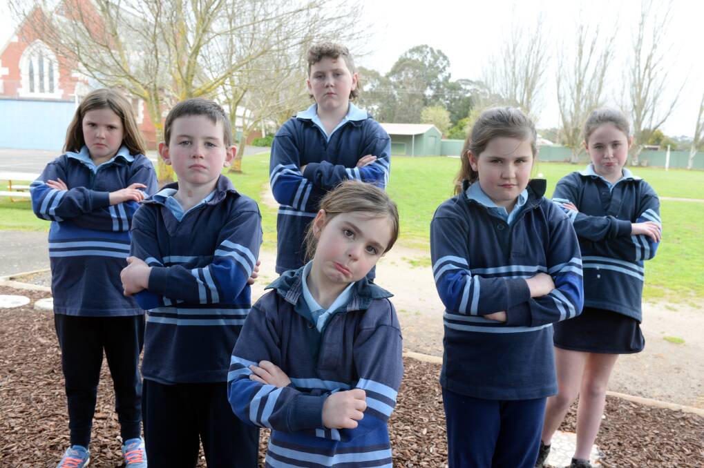 DISAPPOINTED: St Brendan's pupils Sienna, Jack, Casey, Sophie, Lucy and Emma despondent their community fun run has been put on hold. Picture: Kate Healy