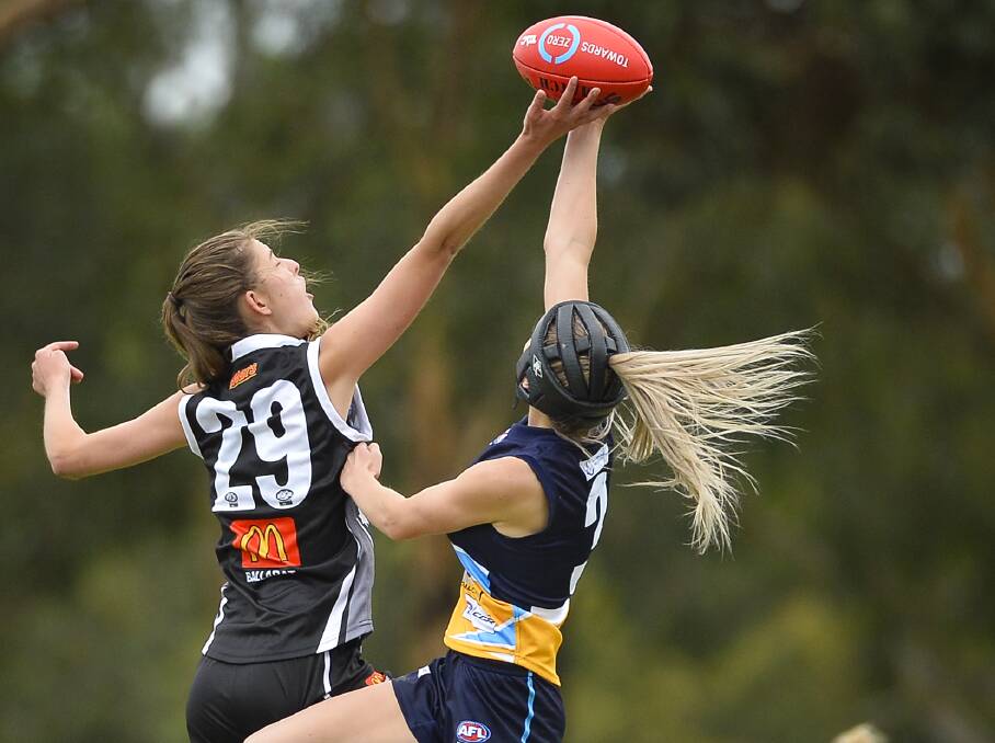 PATHWAY: Rebel Rene Caris, pictured in the ruck against Bendigo last season, is set to make her AFLW debut for Geelong on Saturday. Picture: Dylan Burns