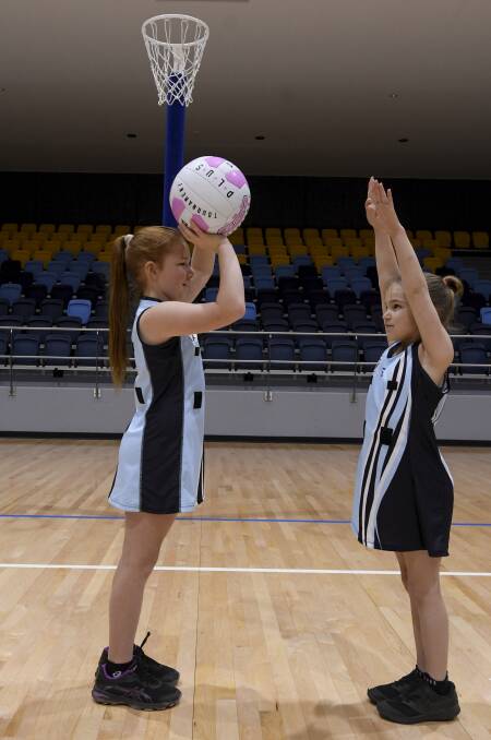 ACTION: Dakodah and Addy Pearce prepare for a return to junior netball at Ballarat Sports and Events Centre after the school holidays.. Picture: Lachlan Bence