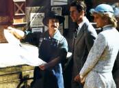 Peter Gilbert delivers Their Royal Highnesses, Prince Charles and Princess Diana, a Wanted poster at Sovereign Hill on April 15, 1983.