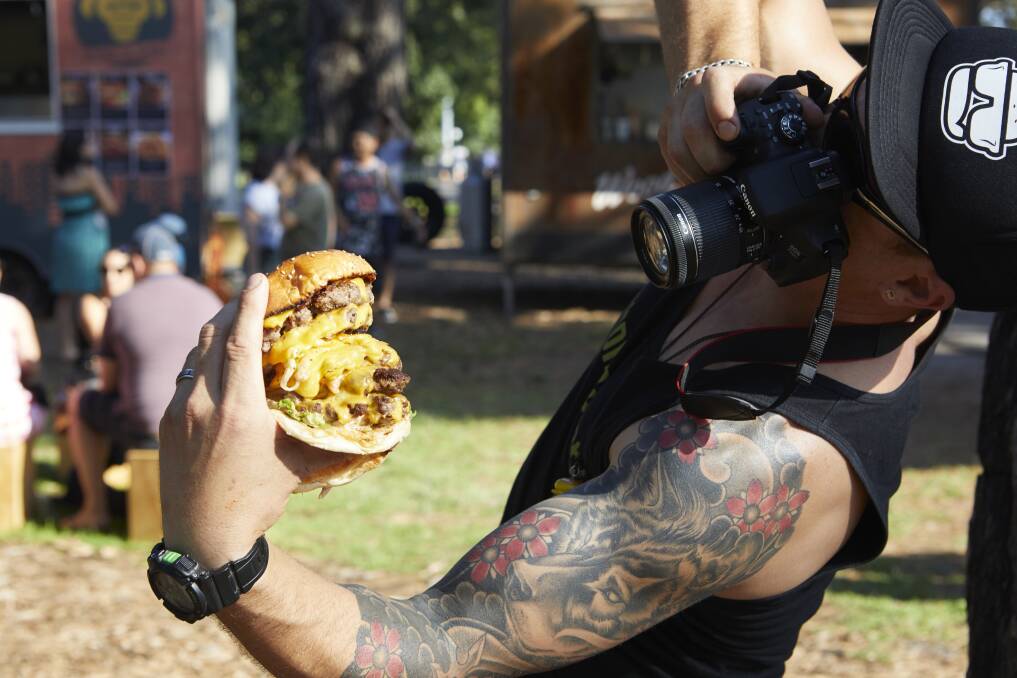 BURGER DELIGHT: Hank Marvin Market is back in town, this time with burgers. Advice is get in early, from 11am, to beat the meal-time rushes. Picture: Shara Henderson