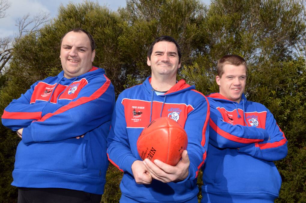 SNARLING: Ballarat Bulldogs premiership players Mark Prebble, David Jenkins and Caleb Lohde talk what it means to be more Bulldogs. Picture: Kate Healy