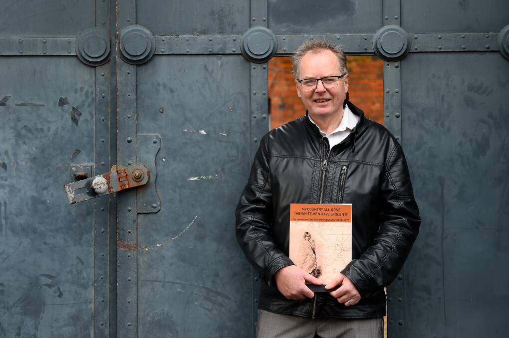 ENRICH HISTORY: Historian Fred Cahir, outside the former Ballarat gaol gates, enjoys working in the city's unfolding story. He wants to help build on the fabric of this story. Picture: Adam Trafford