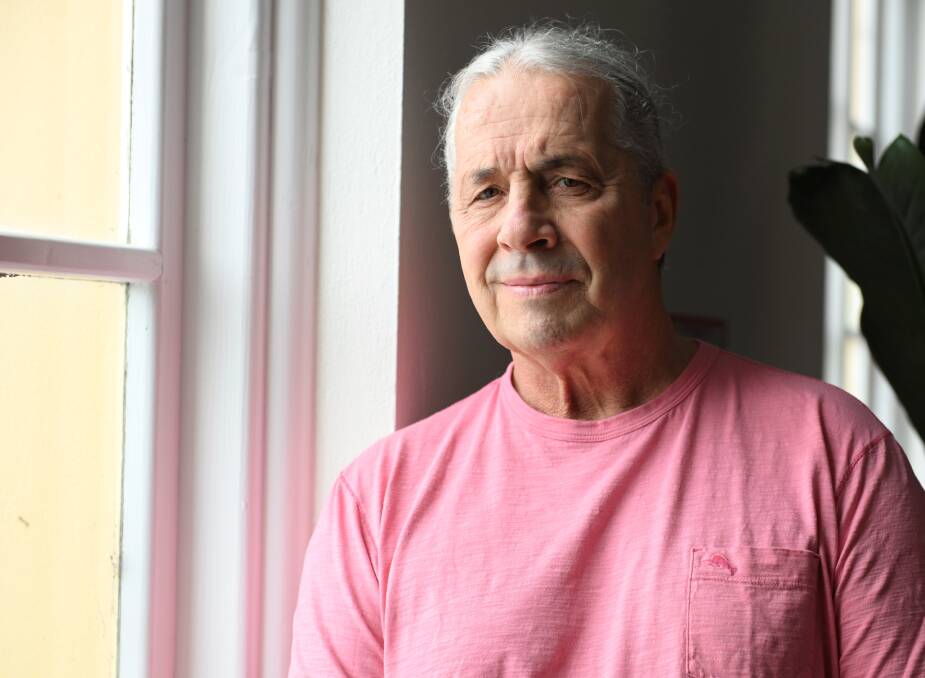 Bret Hart said being Canadian meant he was held on the bottom of the company for a long time; he hoped his story could inspire anybody they could climb to the top. Picture by Lachlan Bence