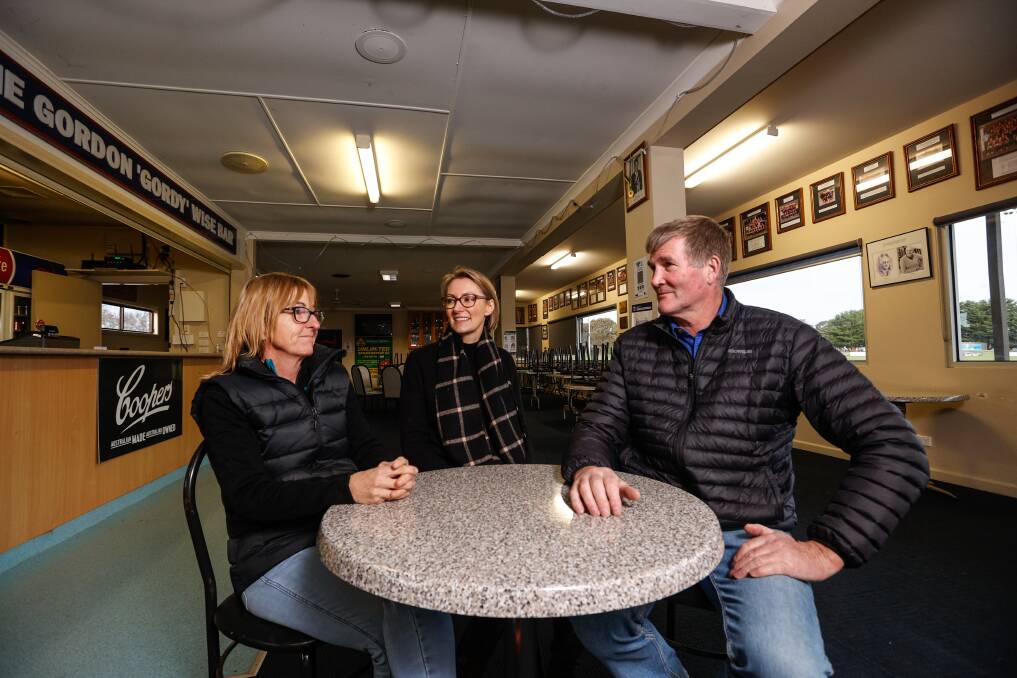 UNITED: Skipton's Simone Smith, Megan Read and Andrew Bodman catch up inside much-loved but much-outdated social club rooms at Skipton Recreation Reserve. Picture: Luke Hemer