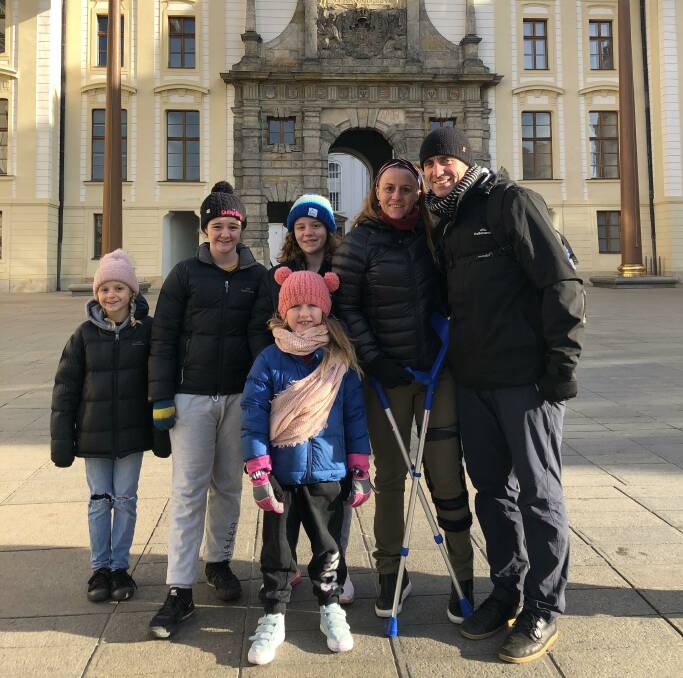 TOGETHER: Melanie Robertson and partner Alex Campbell with their children are living abroad in Italy amid the corona virus emergency lock down.