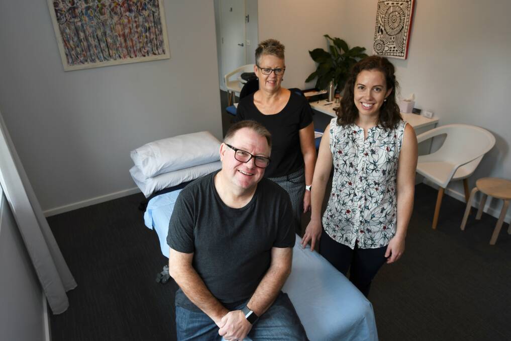 SUPPORT: Jim McMillan and Michelle Callahan with Eureka Osteo director and osteopath Megan May aim to raise awareness about the primary health discipline. Picture: Lachlan Bence