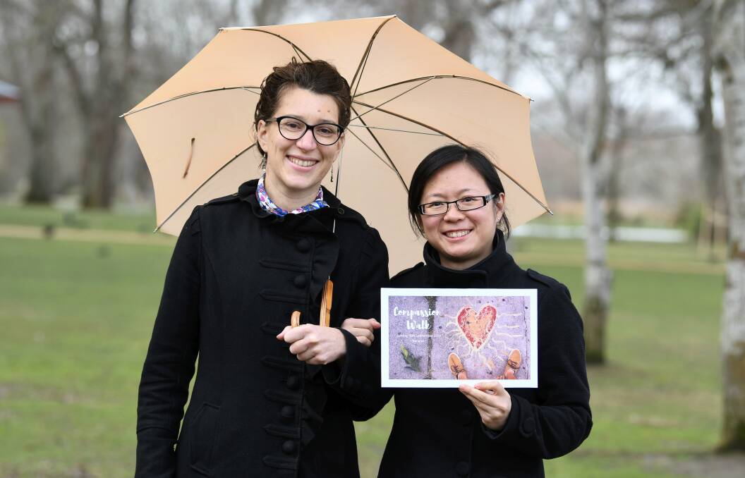 KIND GESTURE: Amie Brulee and Stephanie Wong hope a walk about the Lake Wendouree next month will encourage people to celebrate how important compassion can be in life. Picture: Lachlan Bence