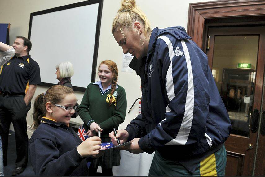 Opal Lauren Jackson, signing an autograph for a Ballarat girl in 2013, hopes to keep inspiring young players. Picture by Lachlan Bence