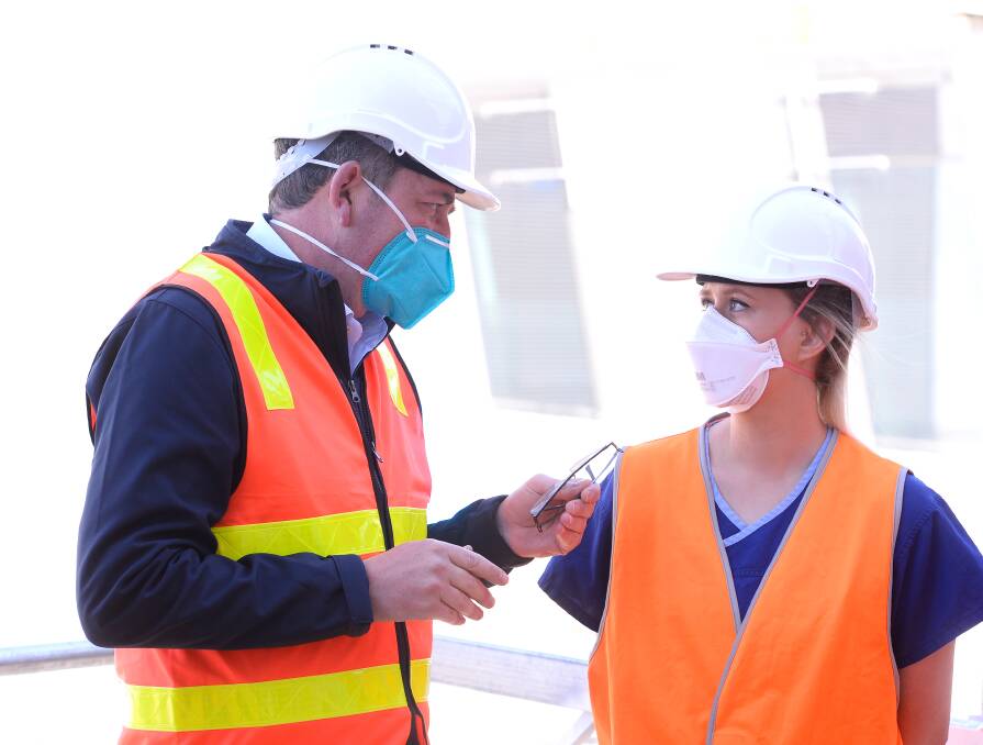 SITUATION: Victorian premier Daniel Andrews chats to Ballarat Base Hospital cardiac physiologist Makala Clifton on Friday in what will become a new cardiac treatment space. Picture: Adam Trafford
