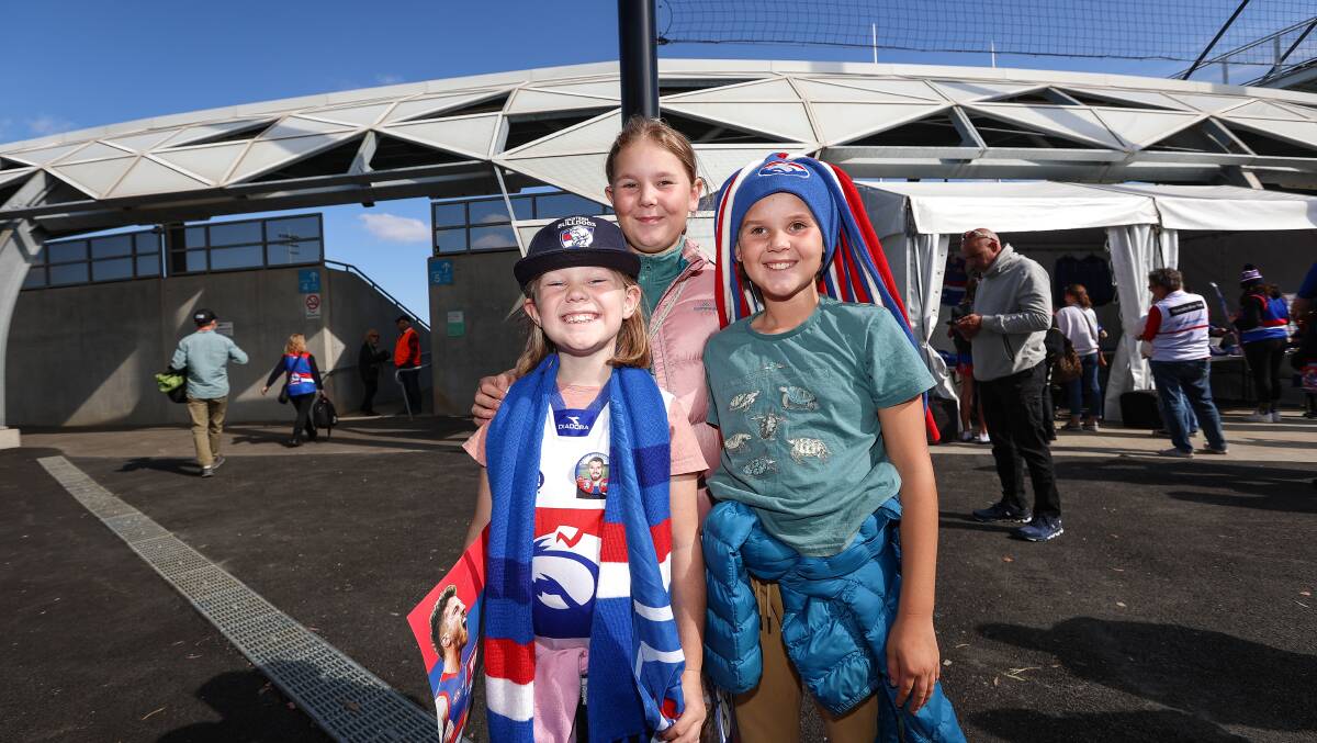 READY: Grace, Cassidy and McKayla Donnellan travelled from the Mallee for the AFL match. Picture: Luke Hemer