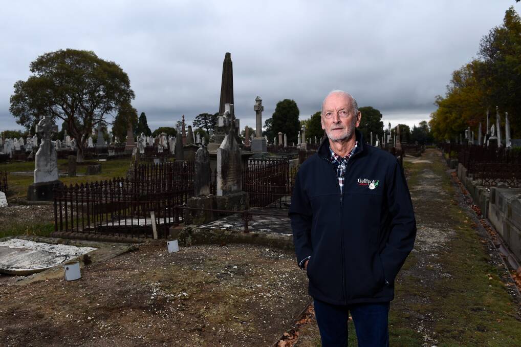 LEGACY: Ballarat war researcher Garry Snowden stands at the unmarked graves of brothers Kevin and William Coghlan, WWI soldiers, who rest in Ballarat Old Cemetery. Picture: Adam Trafford 