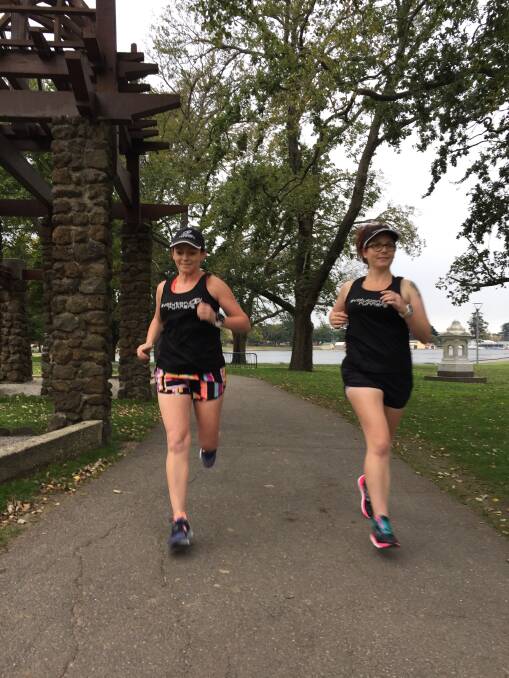 SUPPORT: Evolution Runners coach Louelle Blanchard, left, says exercising outdoors with others in winter help keeps you accountable in moving