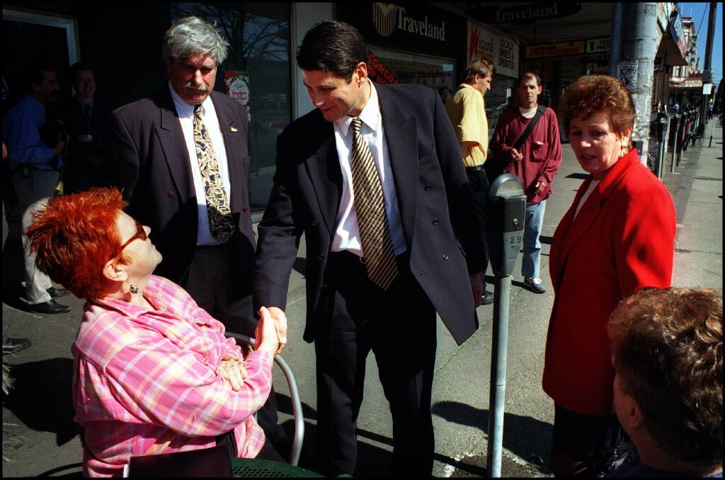 LISTEN: Steve Bracks on the campaign trail along Sturt Street in 1999, flanked by candidates John McQuilten (Ballarat Province) and Karen Overington (Ballarat West). Picture: The Age