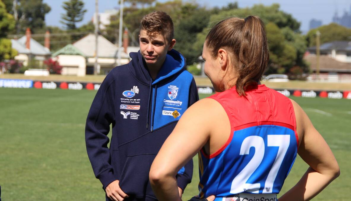 STEPPING UP: Ballarat's Tyler Somerville chats with Western Bulldogs AFLW premiership player Kirsty Lamb at Whitten Oval. Picture: Western Bulldogs Community Foundation.