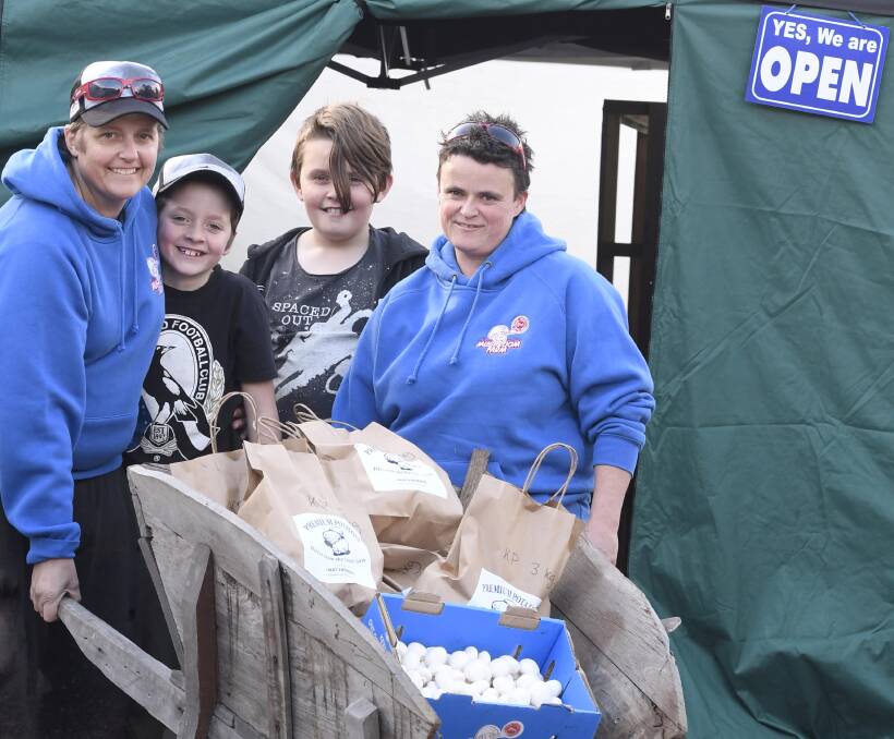 GROWING POTENTIAL: Ballarat Mushroom Farm's Monique Lunn with Zayne Lunn (age nine), Jett (11) and Tanya Lunn at their popular outlet for other producers. Picture: Lachlan Bence