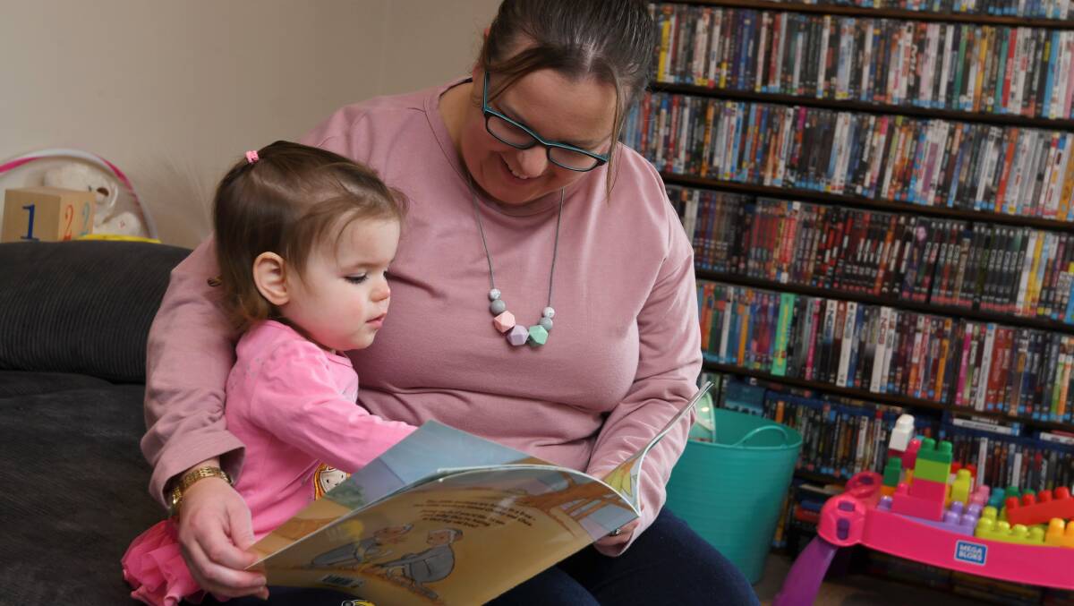 LITERACY: Twenty-two-month-old Charlotte Garlick and mum Rebecca Garlick love reading books that arrive in the letterbox each month from the Ballarat Reads Imagination Library program. Picture: Lachlan Bence