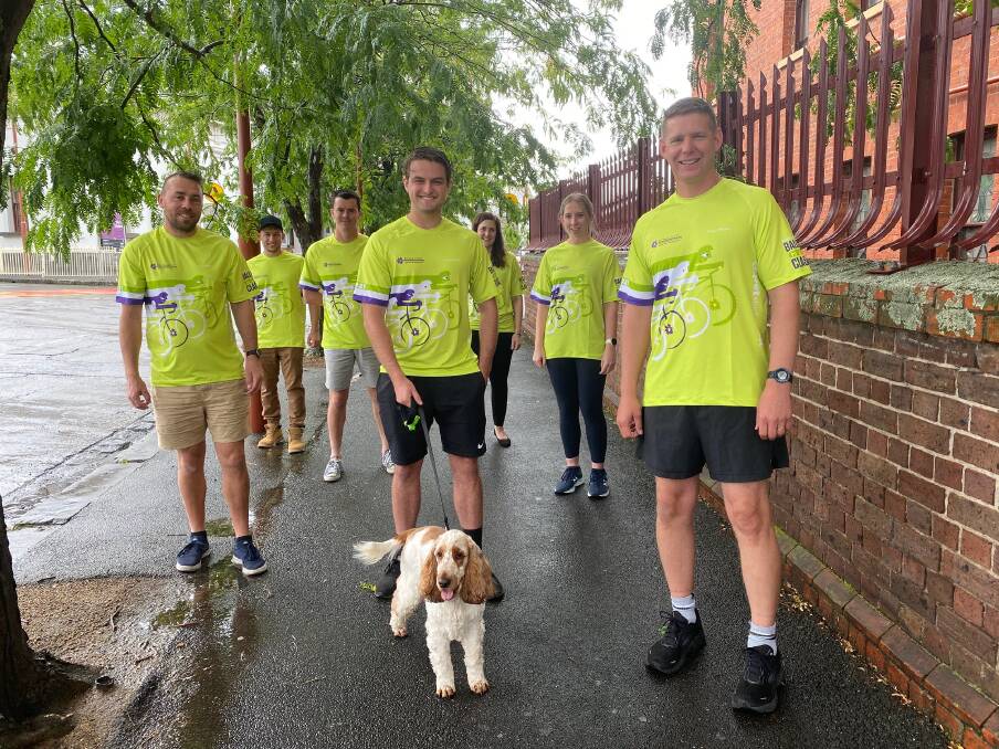 PAWSOME: PETstock marking manager Dion Collard and his team hit the pavement to promote and prepare for the annual family and pet walk in Ballarat Cycle Classic. Picture: courtesy Fiona Elsey Cancer Research Institute