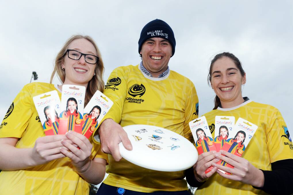 FLYING START: Ballarat Ultimate's Ellie Cushion, Aaron Stewart and Leah Cushion show their bright, rainbow colours for Zaidee. Picture: Kate Healy