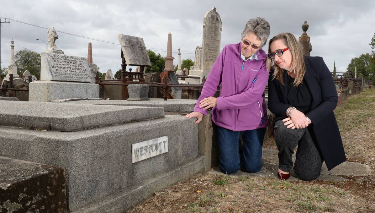 HONOUR: BHS trained nurses league's Trina Jones and Ballarat General Cemetery Trust's Anne De Jong at Westcott family grave. Picture: Kate Healy