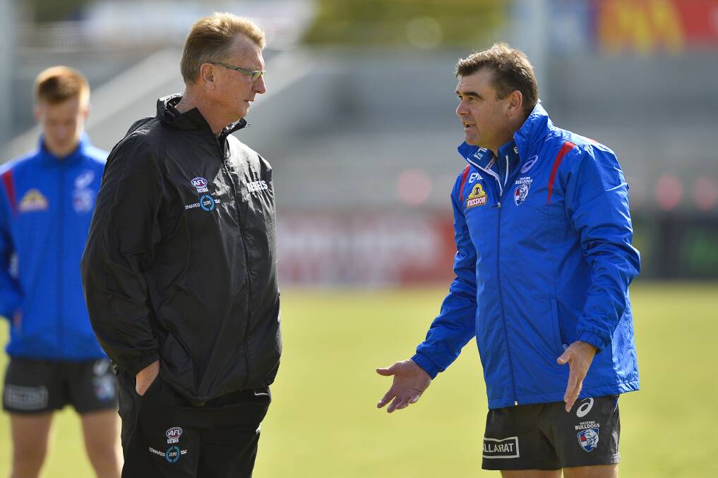 PATHWAY: Western Bulldogs' new football general manager Chris Maple catches up with long-time mentor, Rebels head coach Gerard FitzGerald on the club's Ballarat camp last month. Picture: Dylan Burns