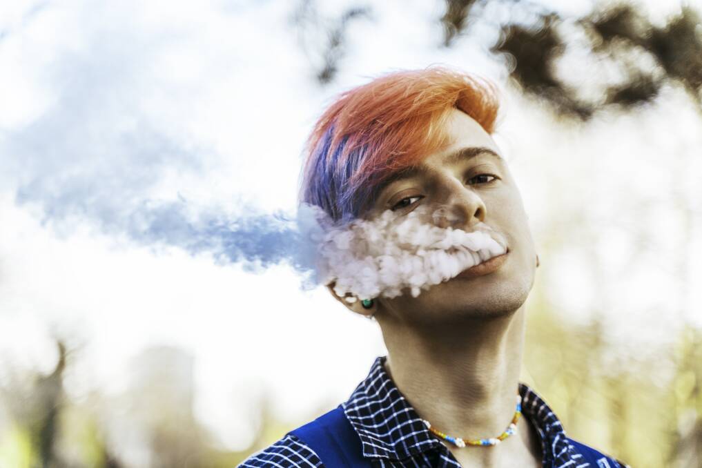 Smoking might be not okay, but young people are deeming vaping socially acceptable in public spaces, a public health expert says. Picture Getty Images