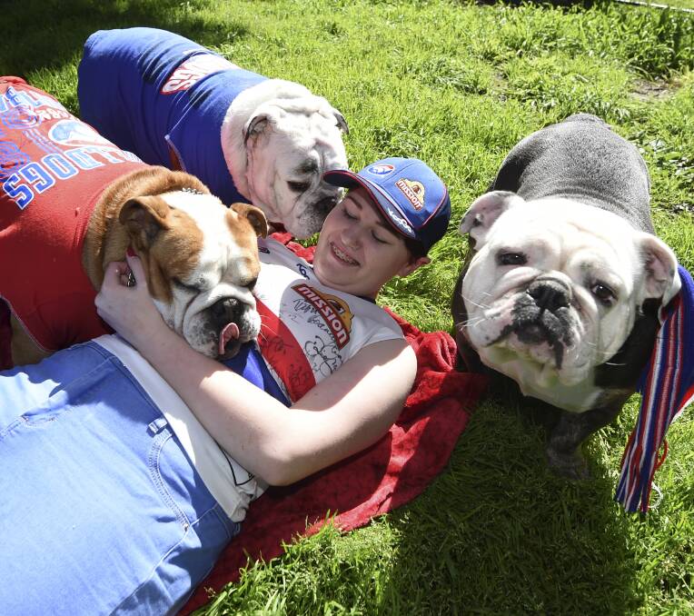 PACK LEADER: Ballarat's Macy Templeton spends time with her Bulldogs before grand final action. Picture: Lachlan Bence