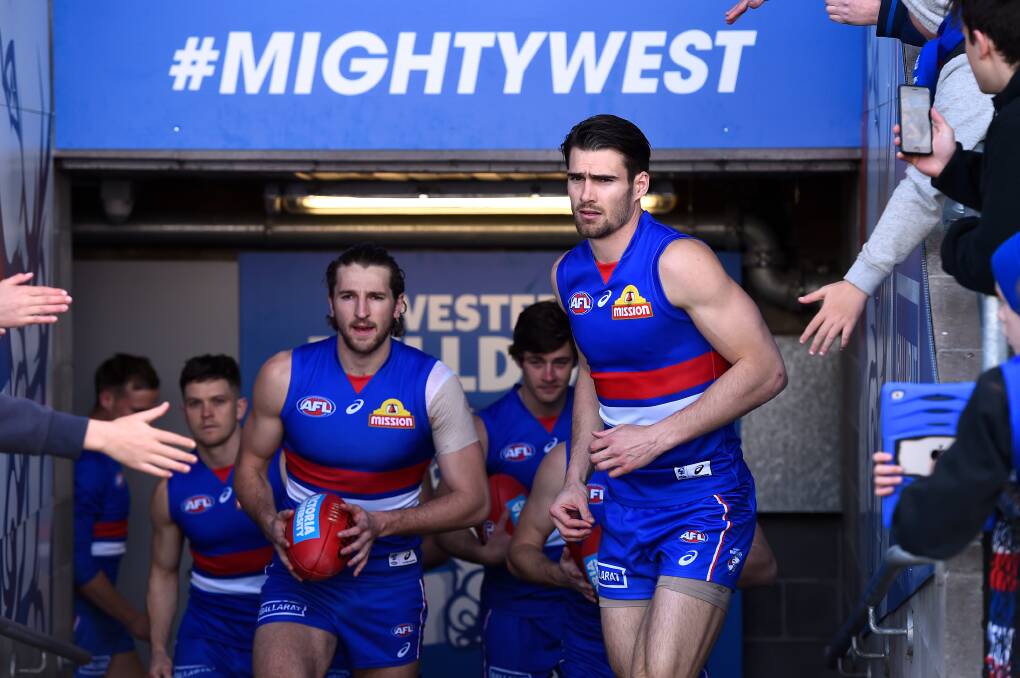MIGHTY MARS: Western Bulldogs' skipper Easton Wood leads him team on to Mars on Sunday. Picture: Adam Traffiord