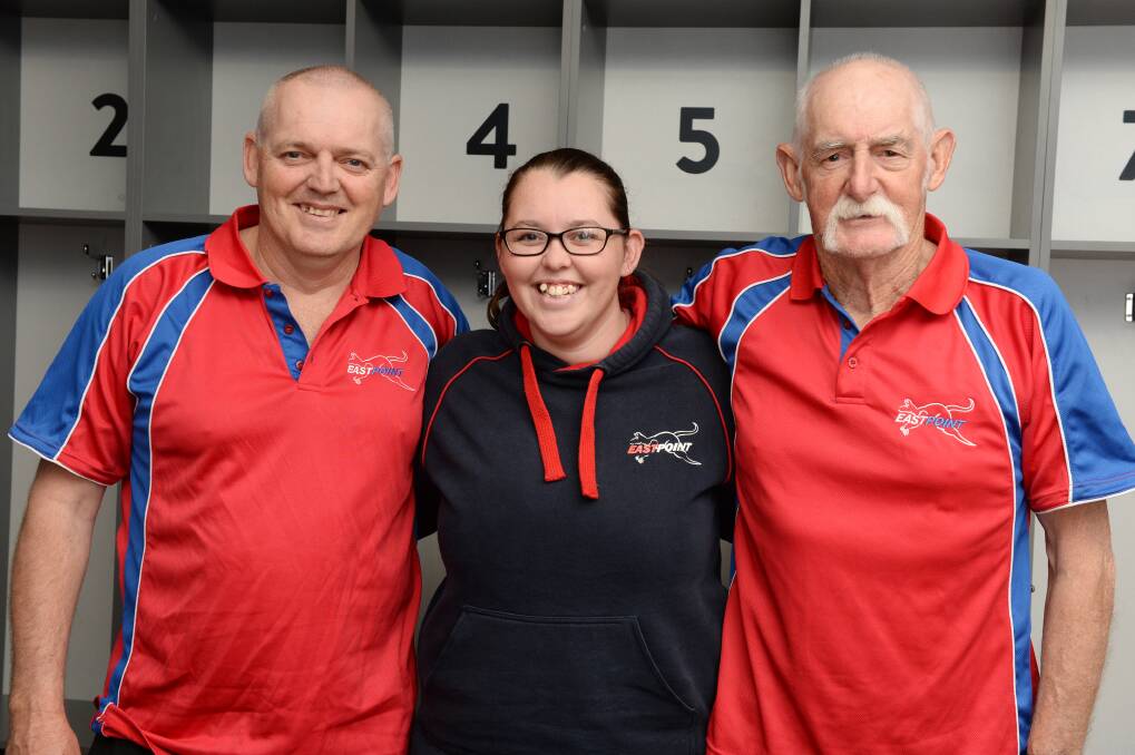 CLUB PRIDE: East Point football trainers Mark Sculley, daughter Emily and dad Ron ahead of the 'Roos' grand final last year. Picture: Kate Healy