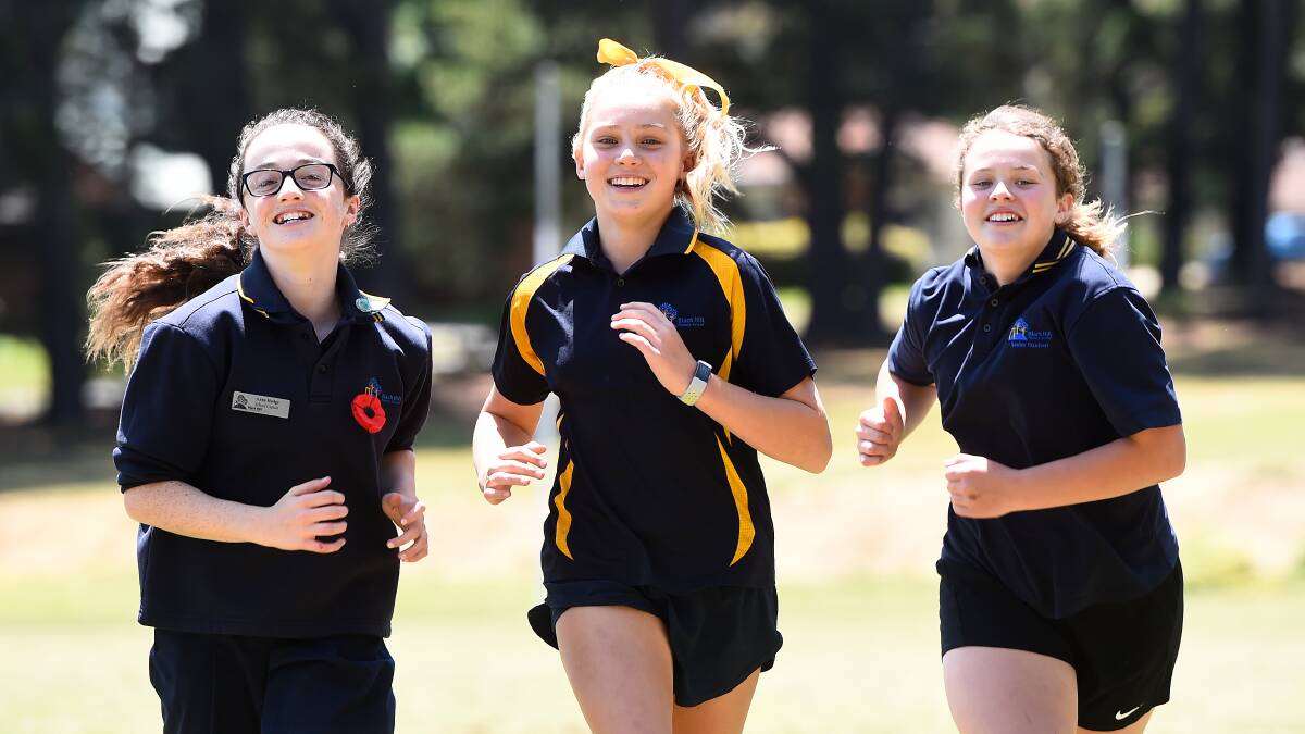 MOTIVATION: Black Hill trio Anna, Maggie and Emmerson have been promoting Run For A Cause in their school community. They hope to spot lots of Black Hill families to cheer on course. Picture: Adam Trafford