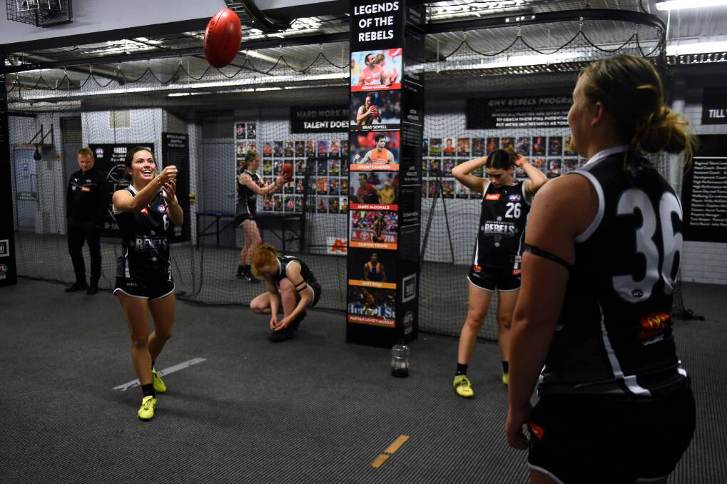 Rebel Claire Lightfoot, at home in one of the most-admired country football rooms, is part of a program that is based in what is to become a world-class sporting arena.
