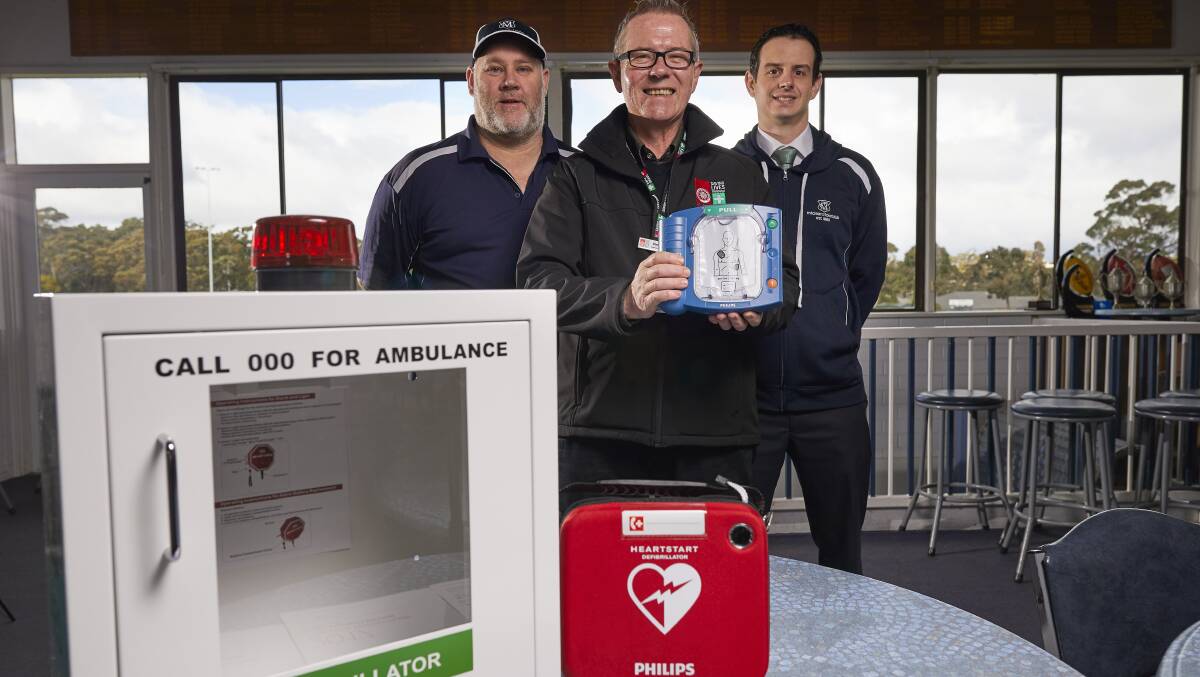 Mt Clear Cricket Club president Anthony Tigchelaar, St John Ambulance's Peter Gunn and Mt Clear Cricket Club treasurer Aaron Burfurd with a new defibrillator for the club in late September.