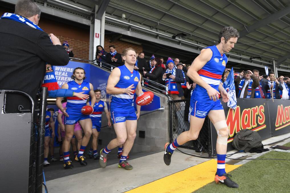 HISTORY: Beloved Western Bulldogs veteran Bob Murphy leads his team out for the first Mars landing on August 19, 2017. Picture: Dylan Burns