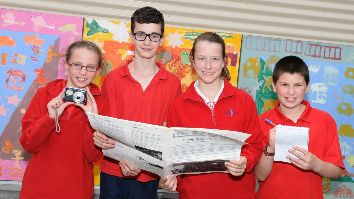 STORYTELLERS: The Lal Lal Local editorial committee Lorelai Henderson, Blake Ryan Anna Inglis and Nick Barton on the look-out for good community issue from children's perspective. Picture: Kate Healy