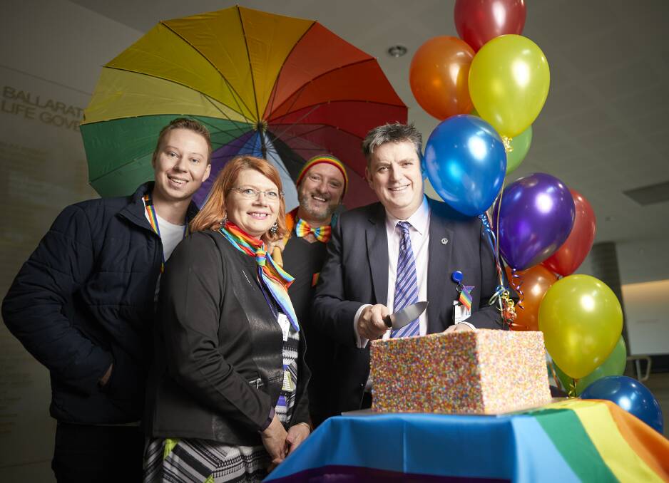 INCLUSIVE: headspace Ballarat's Andy Penny, BHS consumer participation officer Lee-Anne Sargeant, BHS psychiatric nurse Aaron Gore and  BHS chief executive officer Dale Fraser in a colourful, united celebration of diversity. Picture: Luka Kauzlaric