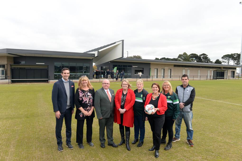 Ballarat mayor Des Hudson and Victorian Community Sport Minister Ros Spence (both centre) with members from Wendouree West tenants Y Ballarat, Wendouree Neighbourhood Centre, Forest Rangers Soccer Club and North Ballarat Cricket Club. Picture by Kate Healy
