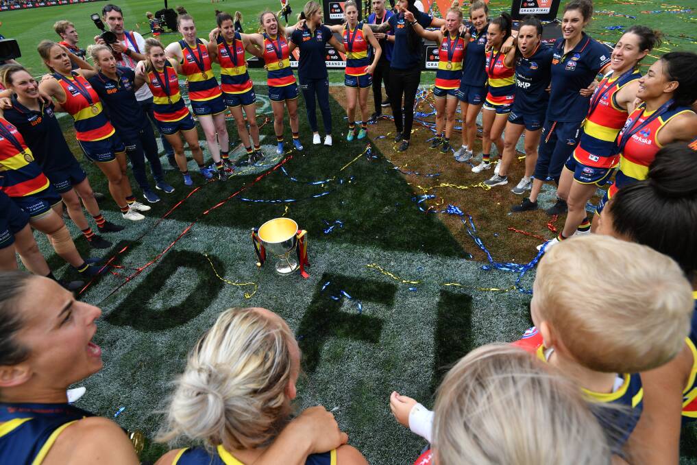 Crows players celebrate after the AFLW grand final match. Picture: AAP