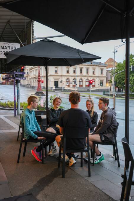 Athletes from Runners Prep, a boutique training service for runners, catch up for a post-run coffee. Picture by Runners Prep