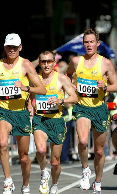 ACTION: Ballarat's Shane Nankervis, far right, in the green and gold in Flinders Street for the 2006 Commonwealth Games marathon. Picture: Lachlan Bence