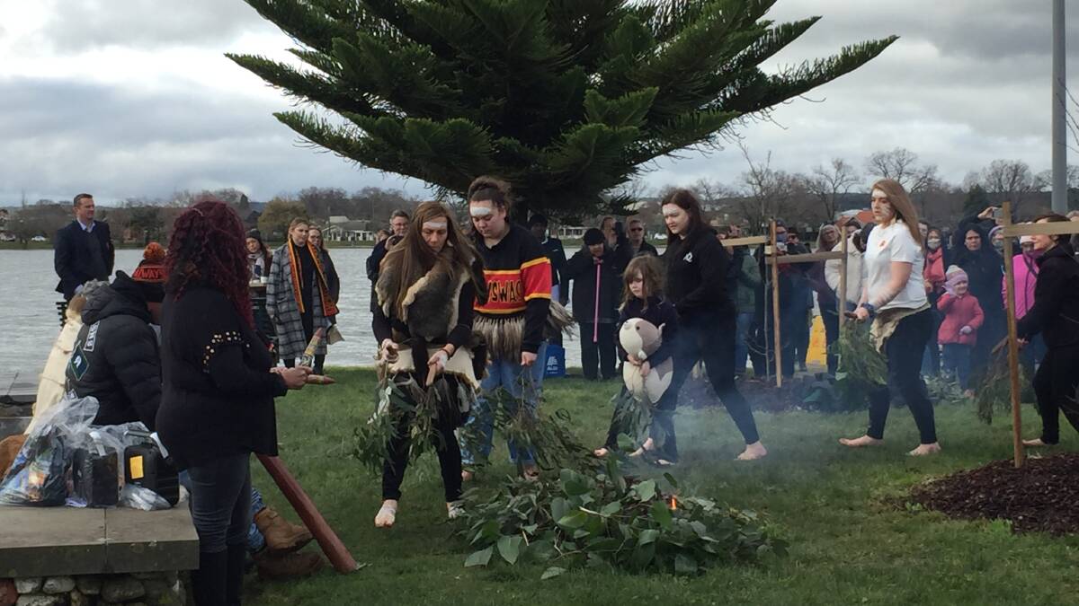 UNITY: A traditional Aboriginal dance at the smoking ceremony featured non-Indigenous councillors Belinda Coates and Tracey Hargreaves at View Point on Monday.