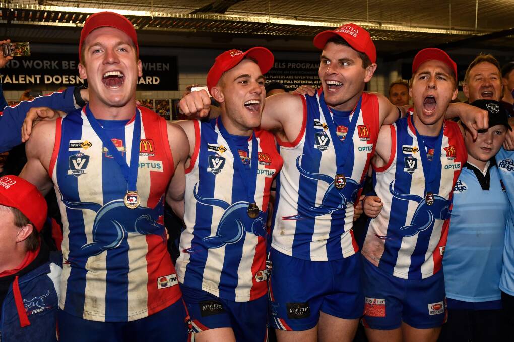GLORY: East Point players celebrate back-to-back BFL premierships in 2019 - a piece of history Dan Jordan fought so hard to secure in his time with the club. Picture: Adam Trafford