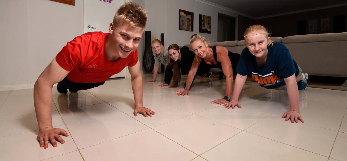 READY: James (age 17), Jonathan (14), Chantelle (15), Elisa and Sebastian (14) Zentveld get ready for the push-up challenge. Picture: Adam Trafford