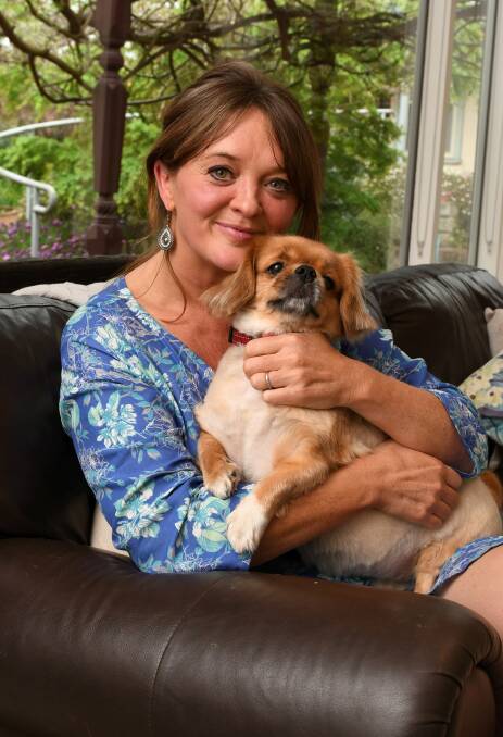 Clare Linane loves spending time with her rescue dog Shadow. Picture: Lachlan Bence