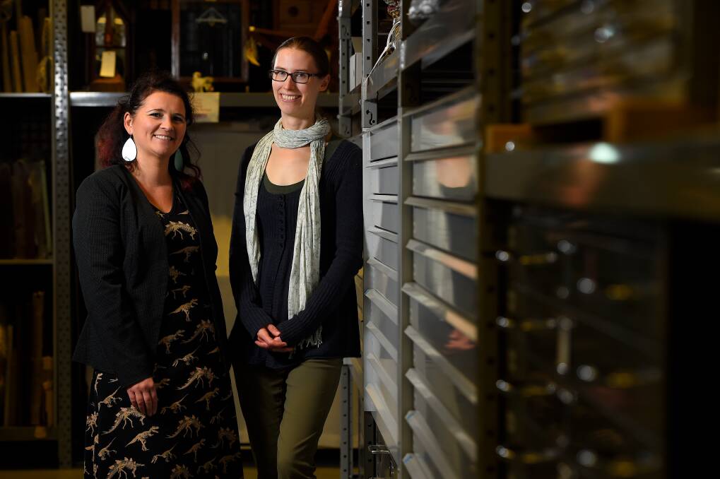 BEHIND SCENES: Sovereign Hill Museum Association's collections manager Elizabeth Marsden and education officer Sara Pearce look deep in archives. Picture: Adam Trafford