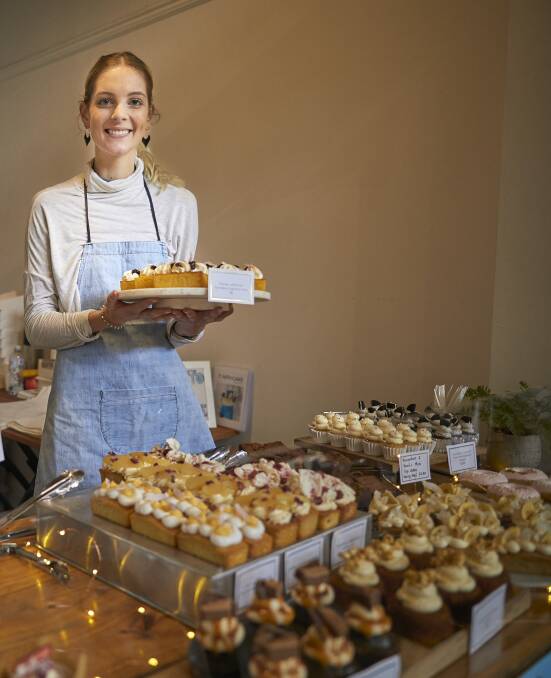COMFORT: T. With Cake's Tanya Alagiozidis serves up a treat for the inaugural Bakers' exchange at The Design Exchange last year. Picture: Luka Kauzlaric