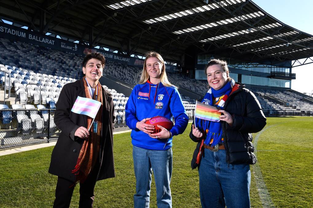PROUD: Speak chief executive officer and co-founder Sage Akouri, Western Bulldogs AFLW footballer Isabella Grant and Western Bulldogs LGBTIQA+ Pride leader Amy Fraby-Jenkins gather at Mars Stadium on Wednesday. Picture: Adam Trafford