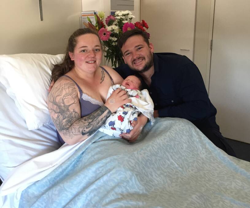 PRECIOUS: New parents Czenzi Riesinger and Shaun Kaiser with Phoebe Christine, Ballarat's first baby born this year, arriving shortly after 3am.
